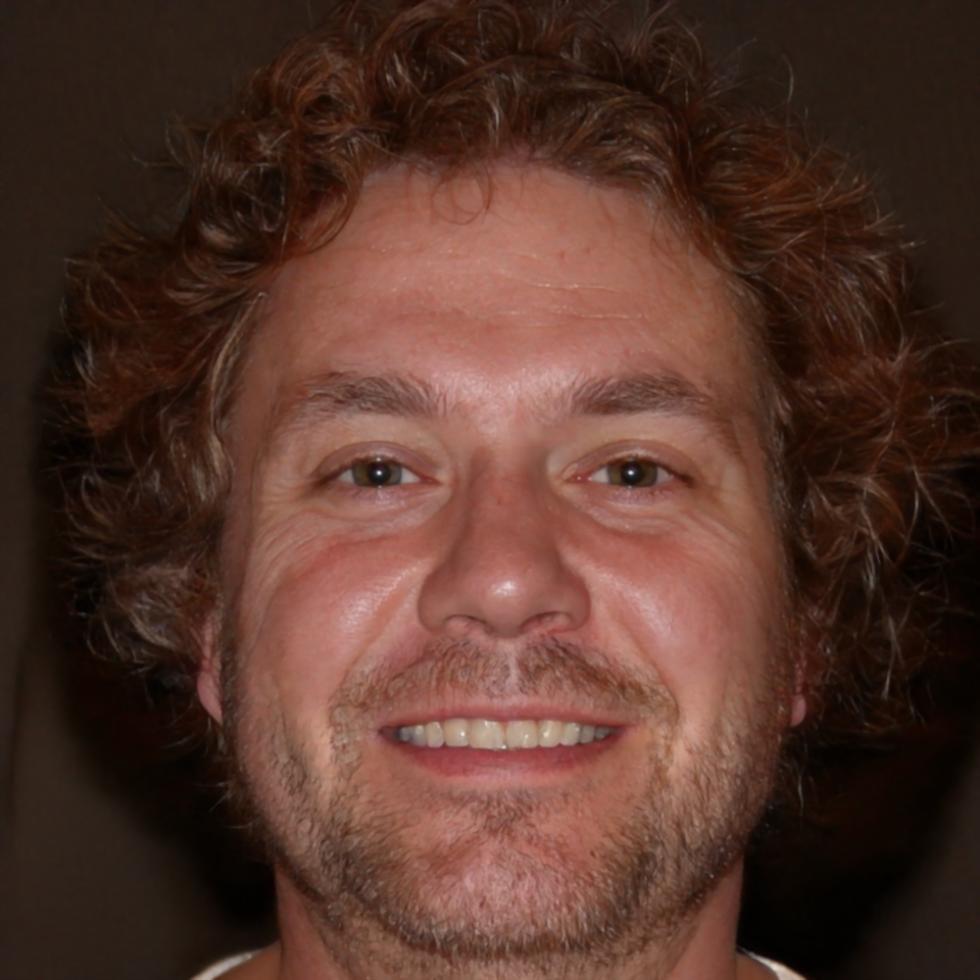 Professional headshot of education coordinator