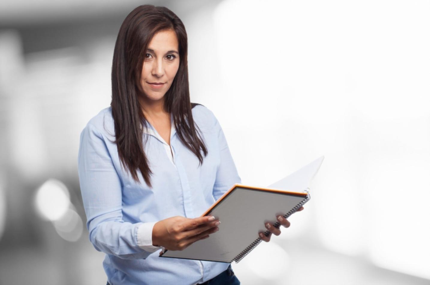 Business meeting with financial charts and budget analysis documents on conference table